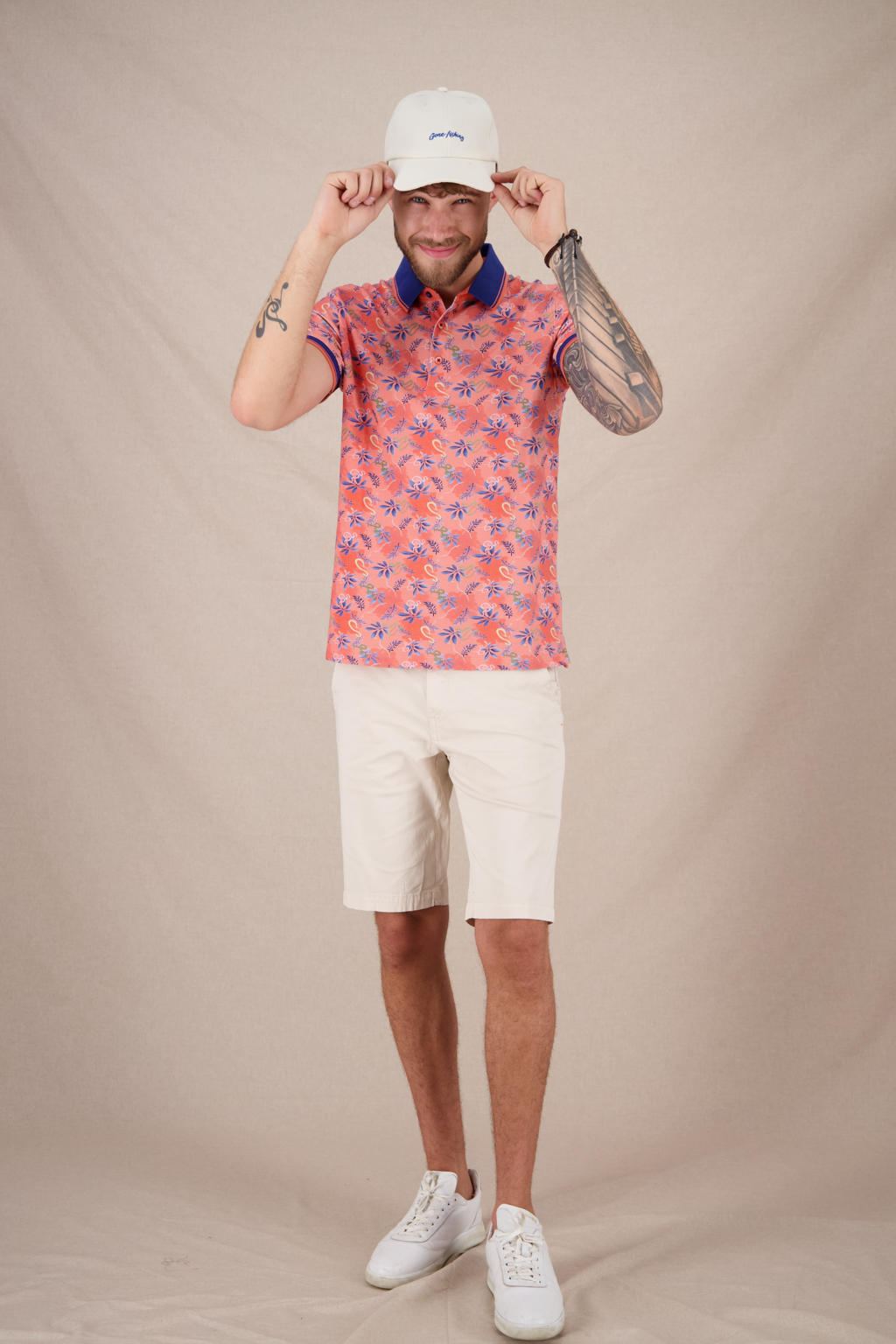 Roze heren A fish named Fred polo met korte mouwen, klassieke kraag en knoopsluiting
